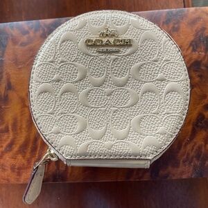 Coach round embossed coin purse beige logo New condition